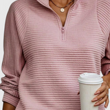 Jersey Helene avec décolleté en V, fermeture éclair et manches longues