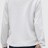 Jersey Helene avec décolleté en V, fermeture éclair et manches longues