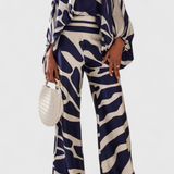 Ensemble de Deux Pièces Sybella avec Top Off-the-Shoulder et Pantalons Amples Imprimés