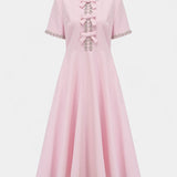 Robe Midi Évasée Linda avec Nœud en Cristal et Détails Élégants