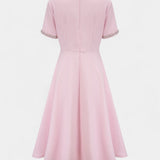 Robe Midi Évasée Linda avec Nœud en Cristal et Détails Élégants