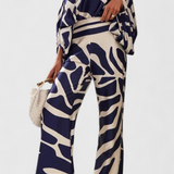 Ensemble de Deux Pièces Sybella avec Top Off-the-Shoulder et Pantalons Amples Imprimés