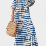 Robe Aroa Boho avec Imprimé Artistique et Silhouette Fluide